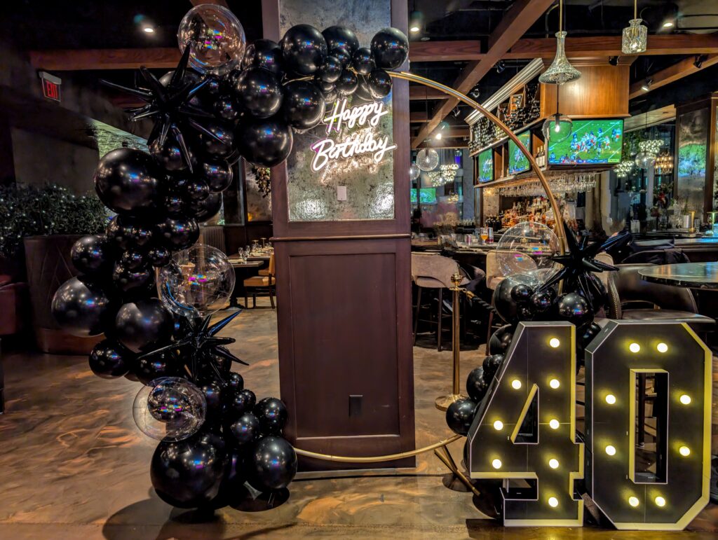 12' Garland on a Loop Frame with Foil Shapes & Marquee Number